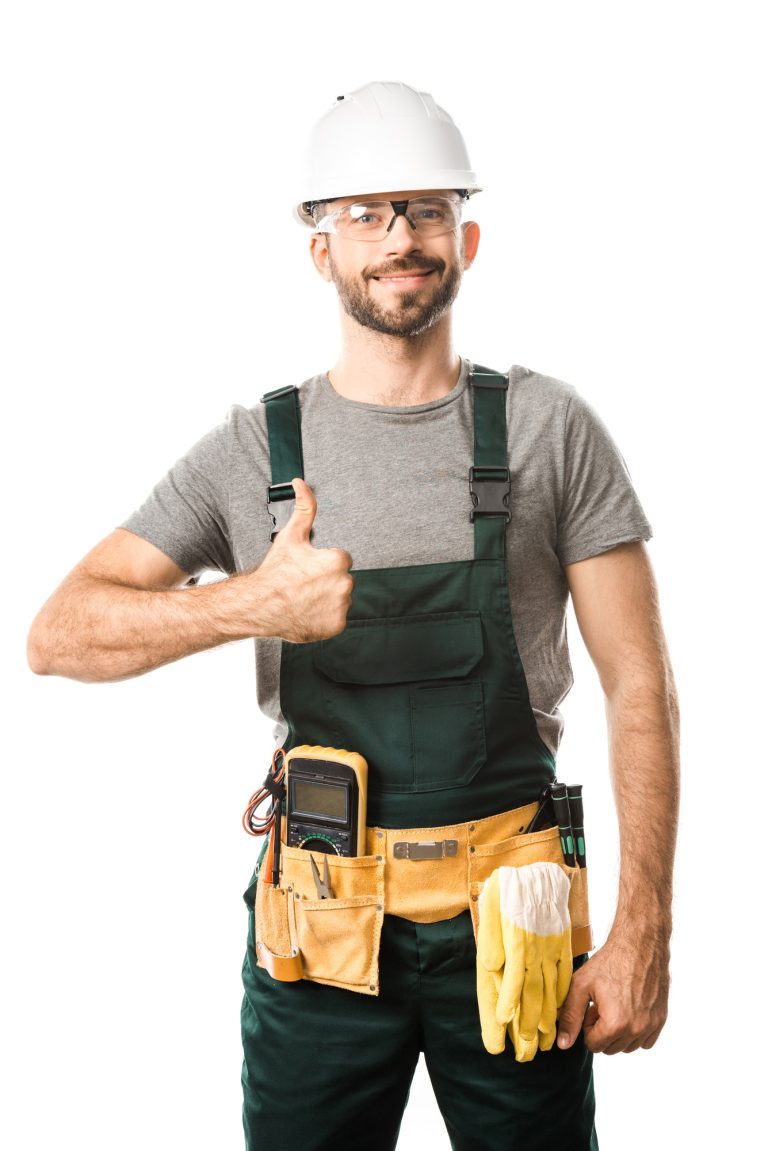 smiling handsome electrician showing thumb up isolated on white